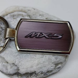 Mazda Schlüsselanhänger gesponnen schwarz - .de
