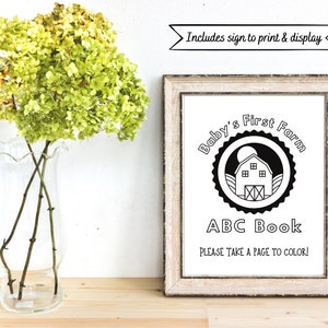 May include: Black and white printable sign for a baby's first farm themed ABC book. The sign features a circle with a barn, moon, and the text "Baby's First Farm". Below the circle is the text "ABC Book" and "Please take a page to color!"