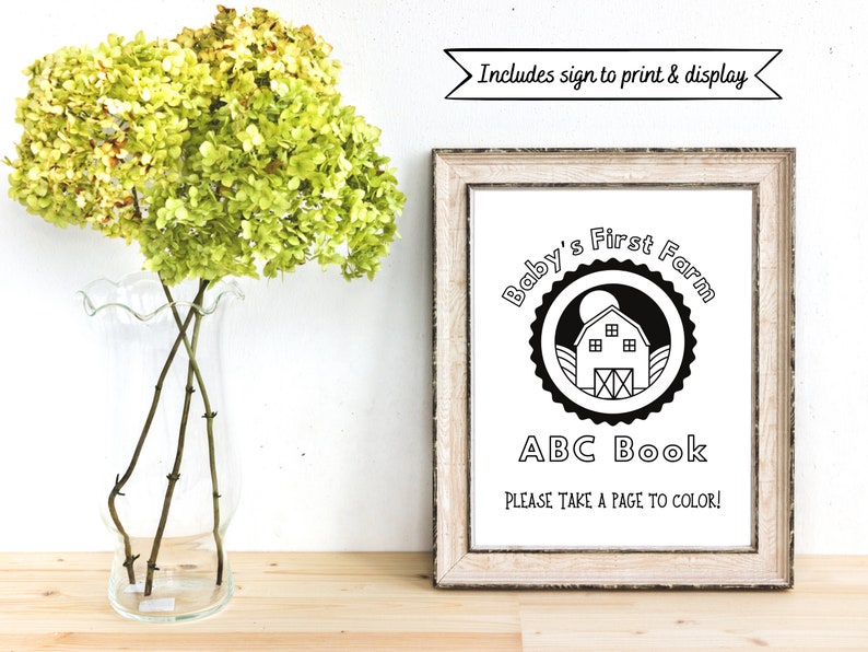 May include: Black and white printable sign for a baby's first farm themed ABC book. The sign features a circle with a barn, moon, and the text "Baby's First Farm". Below the circle is the text "ABC Book" and "Please take a page to color!"