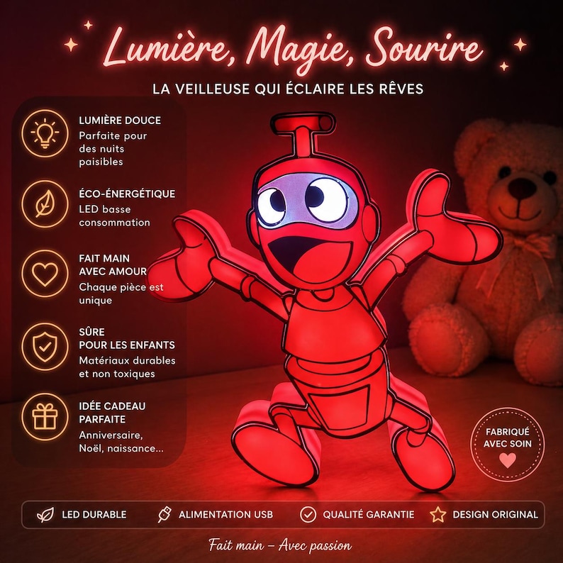 May include: A red robot-shaped night light with the text "Lumi&egrave;re, Magie, Sourire" and "La veilleuse qui &eacute;claire les r&ecirc;ves". The night light is LED and USB powered. A teddy bear is in the background. The night light is made with love and is safe for children.