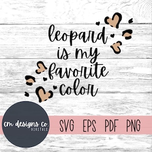 May include: Black and white text on a white wood background reads "leopard is my favourite colour". The text is surrounded by brown leopard print hearts.