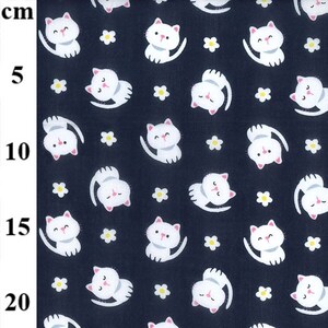 May include: Dark navy fabric patterned with white cartoon cats and small yellow flowers. The cats are in various poses, some upright and others upside down. The fabric is suitable for sewing projects.