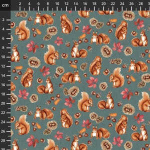 May include: A teal fabric design featuring a repeating pattern of brown squirrels, acorns, pine cones, and red and orange leaves. The illustration has an autumnal theme, ideal for textiles or wallpaper.
