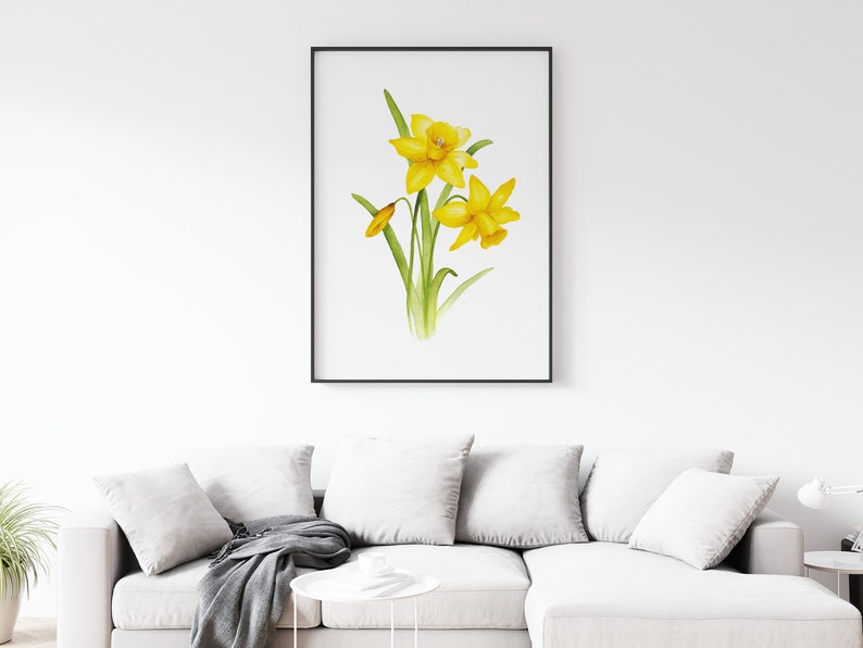 Pode incluir: Uma pintura em aquarela de narcisos amarelos com caules e folhas verdes sobre um fundo branco.
