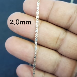May include: A gold chain necklace with a 2.0mm width. The chain is made of small, oval-shaped links.