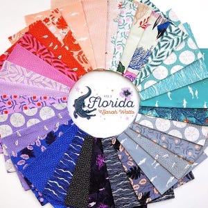 May include: A circular arrangement of fabric swatches in various colors and patterns. The fabrics feature floral, leaf, and aquatic designs. A central white circle displays the text "Florida Vol 2 Sarah Watts" with an alligator illustration.