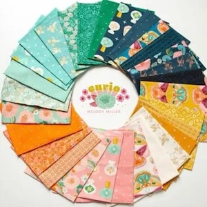 May include: A circular arrangement of fabric squares in various colors and patterns. The fabrics include floral, geometric, and abstract designs in shades of teal, green, orange, pink, and yellow. The center features the text "curio" and "Melody Miller".