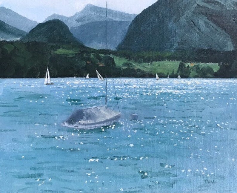 May include: A painting of a lake with mountains in the background. There are several sailboats on the water, and one sailboat is partially submerged. The water is a light blue color and the sky is a light gray color.