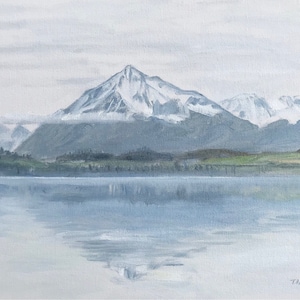 May include: A watercolor painting of a snow-capped mountain reflected in a still lake. The mountain is in the background and the lake is in the foreground. The sky is a light blue and the water is a light blue with a hint of green.