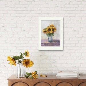 May include: A painting of a bouquet of sunflowers in a vase. The sunflowers are yellow with brown centers and green leaves. The vase is white and the background is a light gray.