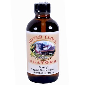 May include: A glass bottle with a brown liquid inside. The bottle has a black label with the words "SILVER CLOUD FLAVORS" and "Brandy Natural Flavor Blend" printed on it. The bottle contains 4 fluid ounces or 118 milliliters of brandy flavoring.