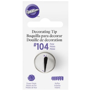 May include: A Wilton decorating tip, model #104, for creating flower petals and ruffles. The package includes the tip and illustrations of the effects. The tip is made of silver-colored metal.