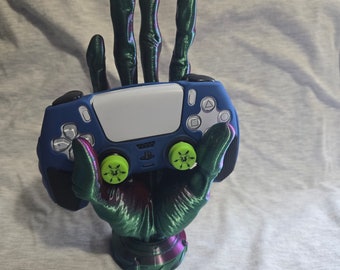 Alien hand gaming controller holder