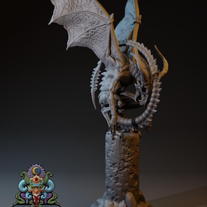 May include: A detailed grey miniature sculpture of a winged demon perched on a textured stone column. The demon has large, detailed wings and a skeletal tail. The base is round. The logo "Claydemon Miniatures" is visible.
