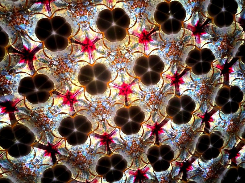 Interactive visual experience: A sophisticated optical instrument that transforms light and color into a dynamic, infinite artwork. Perfect for enhancing a living space.
