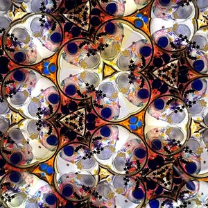 Internal view of the mesmerizing, ever-changing symmetrical patterns created inside the Yabaye kaleidoscope. Visual representation of the therapeutic and meditative optical experience.