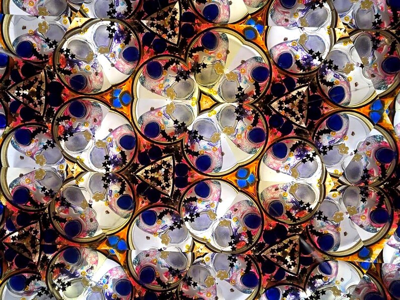 Internal view of the mesmerizing, ever-changing symmetrical patterns created inside the Yabaye kaleidoscope. Visual representation of the therapeutic and meditative optical experience.