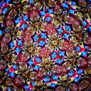 Internal view of the mesmerizing, ever-changing symmetrical patterns created inside the Yabaye kaleidoscope. Visual representation of the therapeutic and meditative optical experience.
