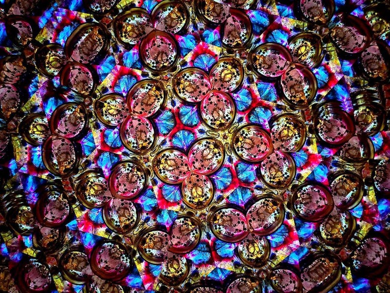 Internal view of the mesmerizing, ever-changing symmetrical patterns created inside the Yabaye kaleidoscope. Visual representation of the therapeutic and meditative optical experience.