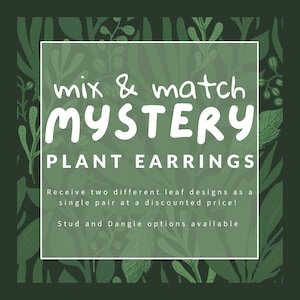 May include: A green background with a white rectangle containing the text "mix & match MYSTERY PLANT EARRINGS". The text below the rectangle reads "Receive two different leaf designs as a single pair at a discounted price! Stud and Dangle options available."