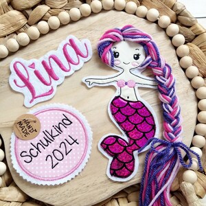 Set of 3D mermaid appliqués with glitter and "Schoolchild 2026" pendant for school cones with wool hair, including name.