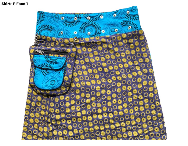 May include: A blue and yellow patterned skirt with a large pocket on the side. The skirt has a blue waistband with black and white circles.