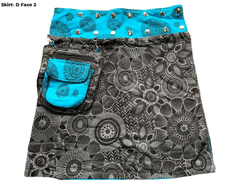 May include: A black and white floral print skirt with a turquoise blue waistband and a matching turquoise blue pocket. The waistband has silver studs.