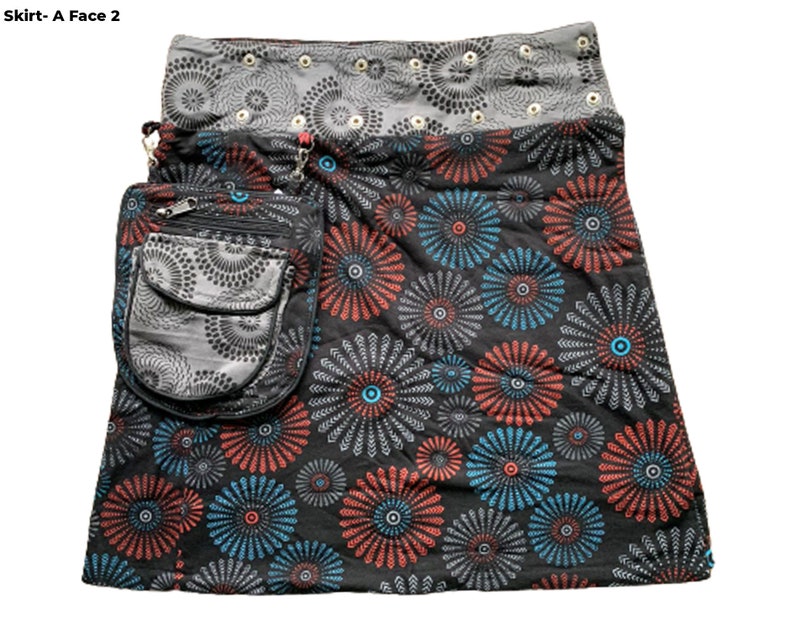 May include: A black skirt with a colorful floral print. The skirt has a large pocket on the side and a gray waistband with silver grommets.