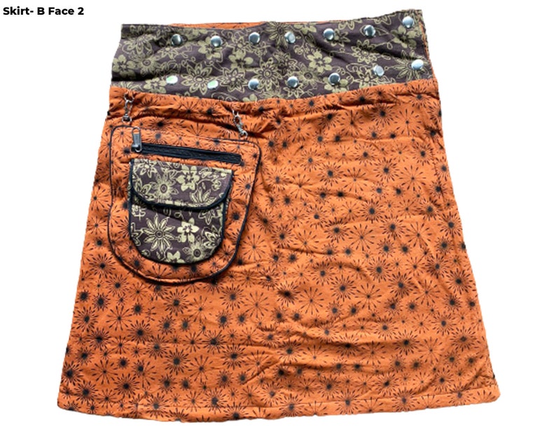 May include: A brown and orange skirt with a floral print and a large pocket on the front. The skirt has a brown waistband with silver studs.