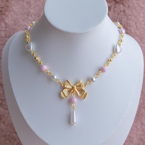 Pink Coquette Necklace: Gold Bow, Faux Pearl Drop