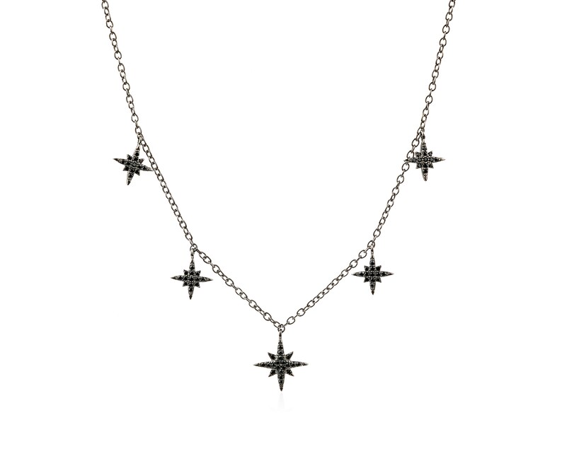 Necklace with 5 pendants in the shape of stars with black cubic zirconias