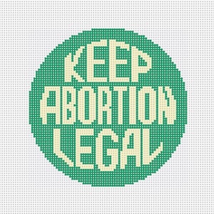 Puede incluir: Un círculo verde con el texto "KEEP ABORTION LEGAL" en blanco.