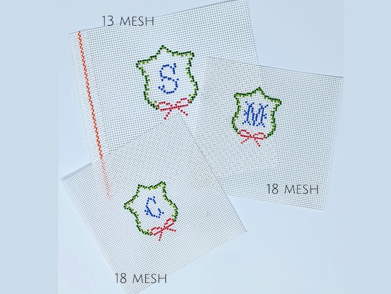 May include: Three white canvas panels with green, blue, and red embroidery of a shield with initials. The panels are labeled "13 MESH" and "18 MESH".