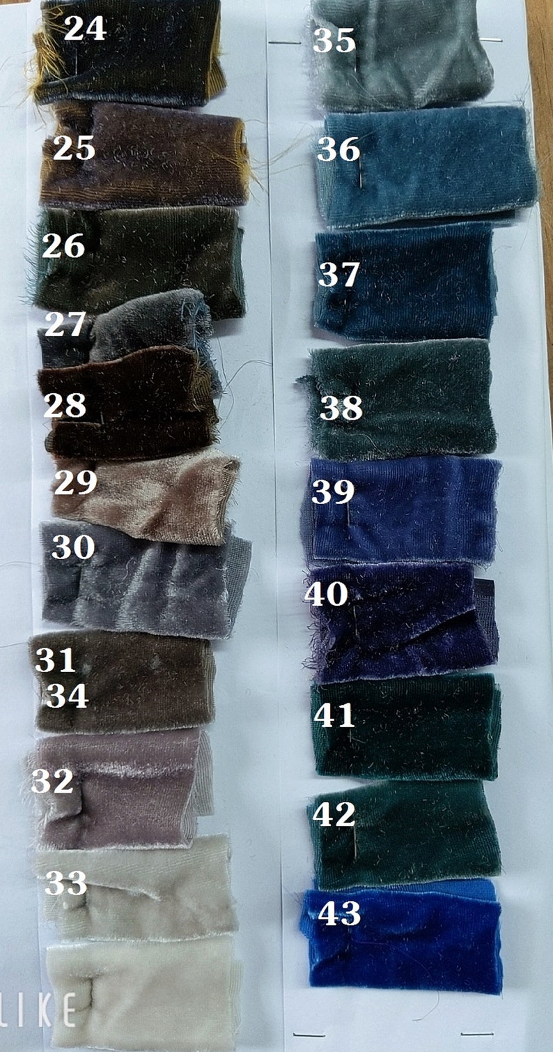 May include: A color chart of fabric swatches, numbered 24 through 43. The swatches are arranged in two columns, with the left column showing shades of brown, gray, and beige, and the right column showing shades of blue and green.