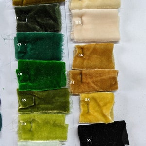 May include: A colour chart of fabric swatches, numbered 44 through 59. The swatches are arranged in two columns, with the left column featuring shades of green and the right column featuring shades of yellow, beige, and white. The swatches are all velvet.