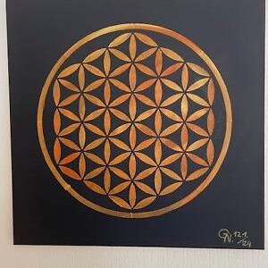 May include: A gold geometric pattern, known as the Flower of Life, is painted on a black canvas. The pattern is a repeating series of overlapping circles, creating a complex and intricate design.