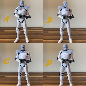 May include: Four images of a white action figure with a grey helmet and armour, holding a black rifle. The figure has a blue head and is posed in different stances. The background is a light brown wall and a wooden floor.