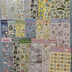 Hoja de pegatinas de Sanrio, pegatinas de Hangyodon, Bad Badtz, Maru, Pochacco, Pompompurin, Cinnamoroll, Tuxedosam, Goropikadon, Doraemon, Peanuts, Snoopy