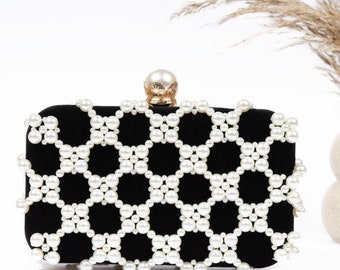 Pearl & soft velvet clutch bag.  This bag is black in velvet fabric with white/ ivory pearls