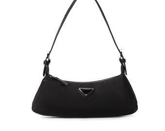 Re-Nylon mini bag. Classy, vintage bag which can be styled as a crossbody or top handle bag.