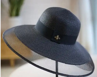 Large brim sun hat.