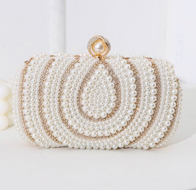 Perle Elfenbein Clutch Tasche mit Gold detailliert Bild 1