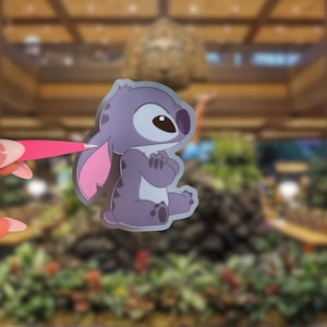 May include: A set of three ceramic mugs with a speckled, matte finish. The mugs are in shades of cream, light gray, and dark gray. Each mug has a simple, minimalist design, perfect for coffee or tea.