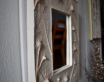 Botanical plaster cast mirror