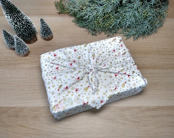 Furoshiki, confezioni regalo in tessuto riutilizzabile, motivi natalizi