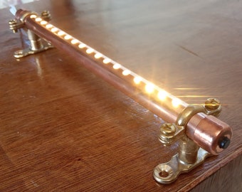 Copper pipe 12V / Mains long led light with switch. Supplied with brass mounting brackets. Campervan, motorhome, boat, reading light.