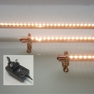Plugin Mains Custom Length Copper Light Fixture, 12-120cm / 4inch-4ft with Soft Touch Dimming. Warm White. Mounted with Brass Munsen Rings.