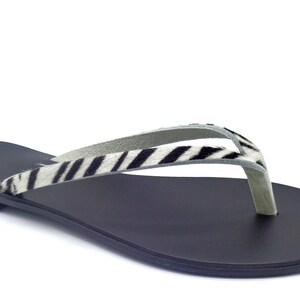 Slippers Apate Handgemaakte Leren Sandalen uit Griekenland Luipaard en Zebra ZEBRA/BLACK