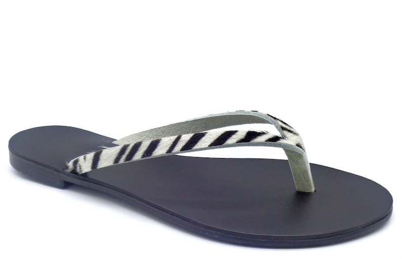 Slippers Apate Handgemaakte Leren Sandalen uit Griekenland Luipaard en Zebra ZEBRA/BLACK