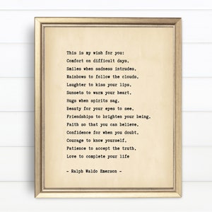May include: A framed print with a vintage aesthetic featuring a poem by Ralph Waldo Emerson. The poem is titled "This is my wish for you" and includes lines like "Comfort on difficult days" and "Love to complete your life".
